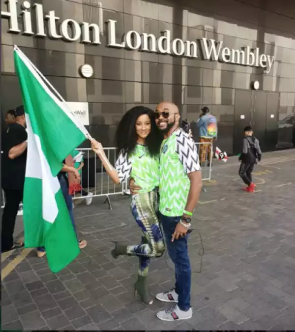 Banky W And Adesua Rock Matching Super Eagles Jerseys In London